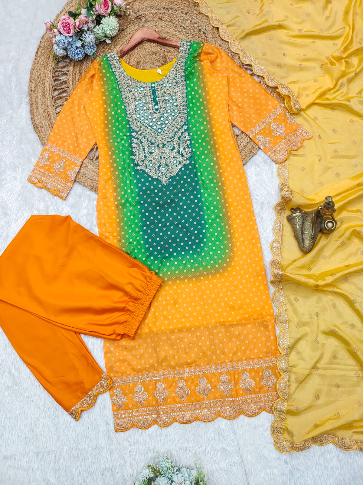 bandhni suit heavy look